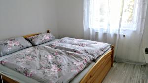 Postel nebo postele na pokoji v ubytování Vila v Podkrušnohoří