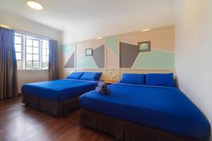 Ένα ή περισσότερα κρεβάτια σε δωμάτιο στο Parkland Apartments