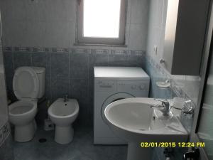 Vannituba majutusasutuses Hotel Restaurant Globi