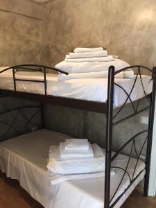 A bed or beds in a room at Luxury Beach Apartment in Athens Riviera