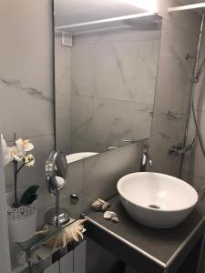 A bathroom at Luxury Beach Apartment in Athens Riviera
