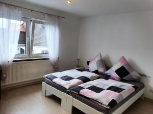 Katil atau katil-katil dalam bilik di Pension Nickel Ferienwohnung II Waldstraße 18 Alsbach-Hähnlein