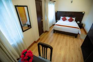 Voodi või voodid majutusasutuse Kathmandu Sunny Hotel toas