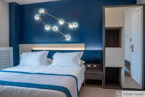A bed or beds in a room at San Lorenzo - Boutique Hotel & SPA
