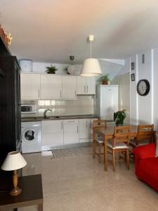 A kitchen or kitchenette at Tenerife apartamento Sun Beach & Relax