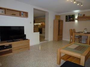 TV/trung tâm giải trí tại Ferienwohnung Schwarzwaldsteig