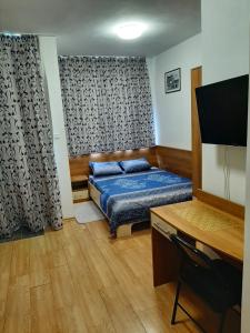 A bed or beds in a room at Apartment Jasna