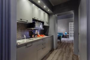 Kuchyň nebo kuchyňský kout v ubytování Maison Matilde design apartment in the heart of Sorrento