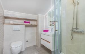 Koupelna v ubytování Apartments Vila DK + 37 fotografií