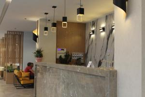 Лобі або стійка реєстрації в Hotel Triumf Shengjin