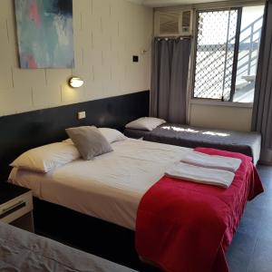 Postel nebo postele na pokoji v ubytování Motel Lodge
