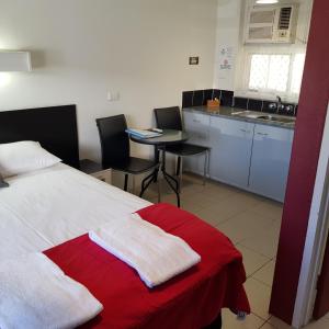 Kuchyň nebo kuchyňský kout v ubytování Motel Lodge