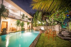 Swimmingpoolen hos eller tæt på Asri Sari Ubud Resort and Villa