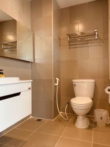 Ένα μπάνιο στο De Hug Hotel & Residence