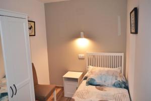 Postel nebo postele na pokoji v ubytování CASA SOLORGA - apartamentos rurales