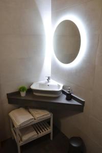 Et badeværelse på CASA SOLORGA - apartamentos rurales