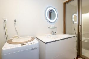 Koupelna v ubytování Tsukinowacho House