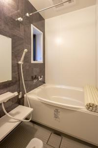 Koupelna v ubytování Kizuna House near Nijo Castle + 32 fotografií