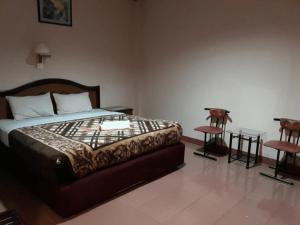 Postel nebo postele na pokoji v ubytování Hotel Parewisata + 28 fotografií