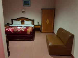 Postel nebo postele na pokoji v ubytování Hotel Parewisata