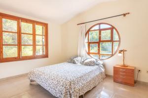 Postel nebo postele na pokoji v ubytování Villa Costa De Blanes