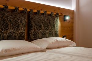 Bioagritur La Casa dei Trajeri客房内的一张或多张床位
