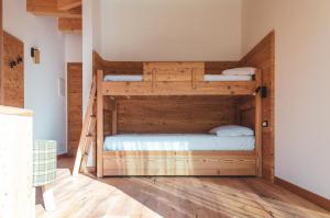 Bioagritur La Casa dei Trajeri客房内的一张或多张床位