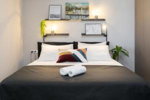 Posteľ alebo postele v izbe v ubytovaní Apartmani Vale