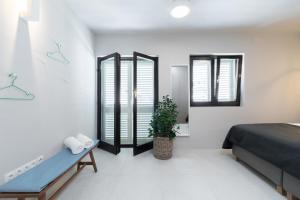 Posteľ alebo postele v izbe v ubytovaní Apartmani Vale
