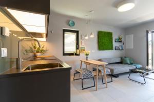 Kuchyňa alebo kuchynka v ubytovaní Apartmani Vale