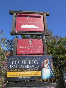 a sign for the lighthouse hotel your big day deserves something special at Oyster Fleet Hotel in Canvey Island