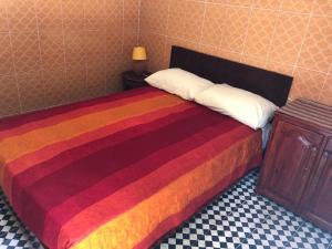 Postel nebo postele na pokoji v ubytování Youth Hostel International Fez