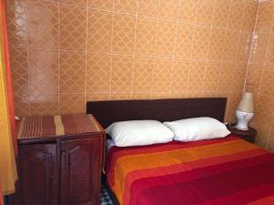 Postel nebo postele na pokoji v ubytování Youth Hostel International Fez