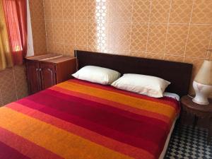 Postel nebo postele na pokoji v ubytování Youth Hostel International Fez