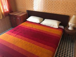 Postel nebo postele na pokoji v ubytování Youth Hostel International Fez