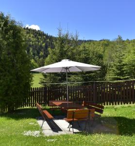Vonkajšia záhrada v ubytovaní Apartament Rojka