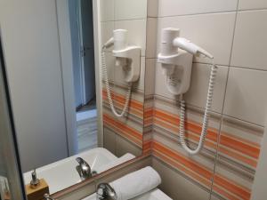Koupelna v ubytování Rooms Ambrožič + 25 fotografií