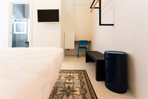 A bed or beds in a room at Viasarnelli72