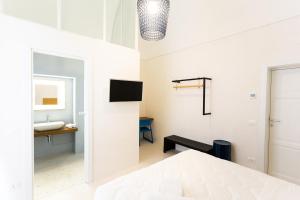 A bed or beds in a room at Viasarnelli72