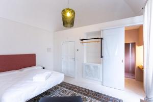 A bed or beds in a room at Viasarnelli72