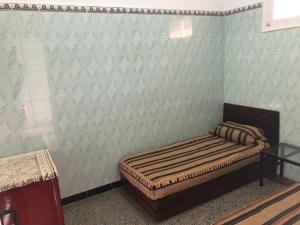 Postel nebo postele na pokoji v ubytování Youth Hostel International Fez