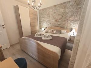 Posteľ alebo postele v izbe v ubytovaní Charming apartment piccolo paradiso