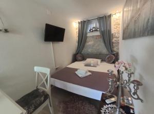 Posteľ alebo postele v izbe v ubytovaní Charming apartment piccolo paradiso