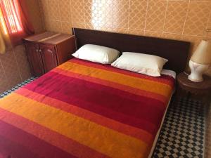 Postel nebo postele na pokoji v ubytování Youth Hostel International Fez