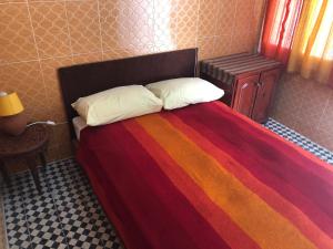 Postel nebo postele na pokoji v ubytování Youth Hostel International Fez