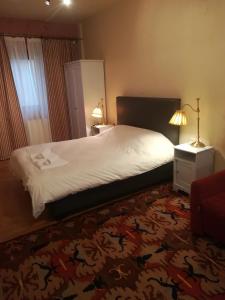 
Ένα ή περισσότερα κρεβάτια σε δωμάτιο στο Guest House Ioanna Arachova
