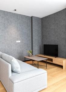 TV a/nebo společenská místnost v ubytování Hotel Forum Ceao