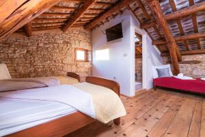 Postel nebo postele na pokoji v ubytování Holiday house Meri + 31 fotografií