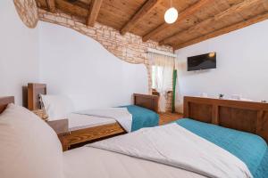 Postel nebo postele na pokoji v ubytování Holiday house Meri