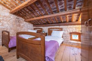 Postel nebo postele na pokoji v ubytování Holiday house Meri
